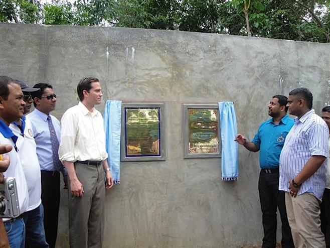 Christopher Mitchell (left) and local officials dedicate a new water tank in Walallgoda, Sri Lanka. Mitchell and the Wauwatosa Mayfair Rotary Club raised money and organized a project to provide water to the village. 