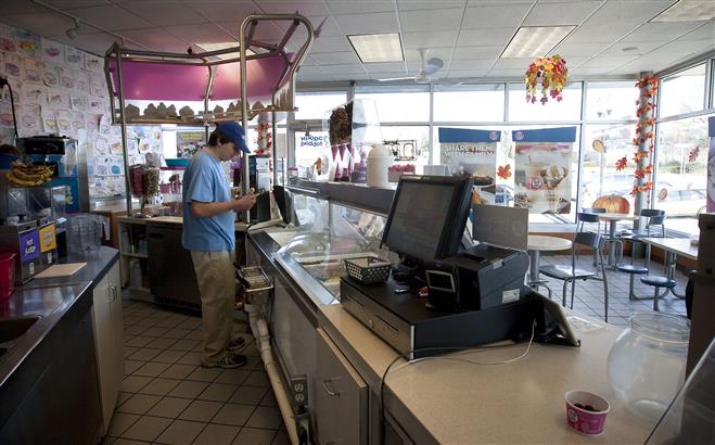 Danny Leffler gathers materials to decorate an ice cream cake in the Baskin Robbins ice cream shop on Wauwatosa Avenue on Nov. 14. Leffler is a former Wauwatosa East High School student and currently part of Next Steps.