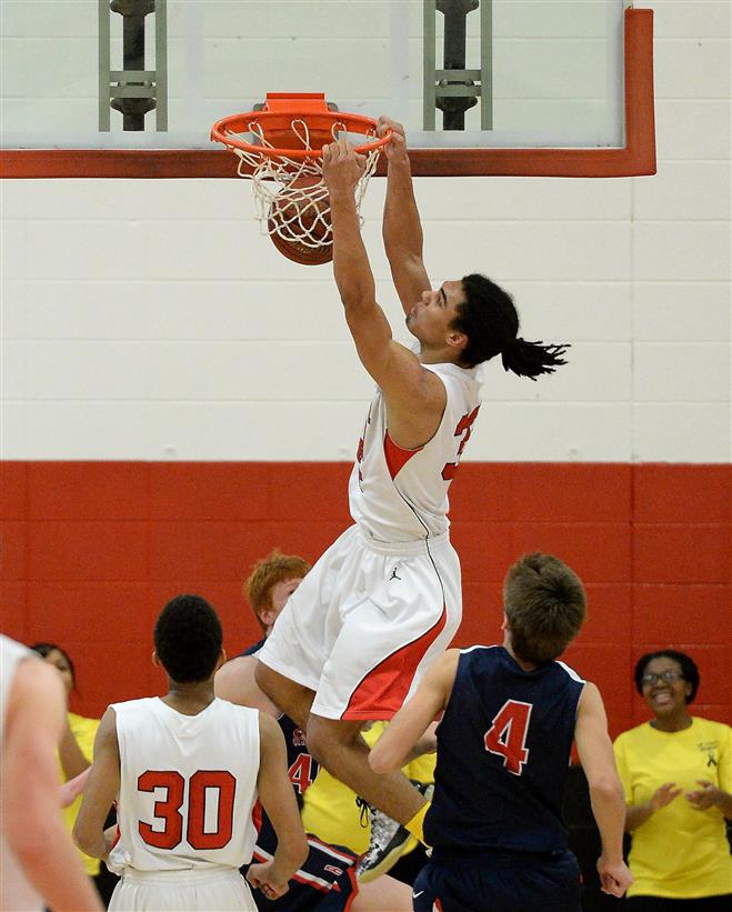 Wauwatosa East senior center Nick Pridgeon throws down a dunk against Brookfield East on Friday at home in a 48-45 loss.