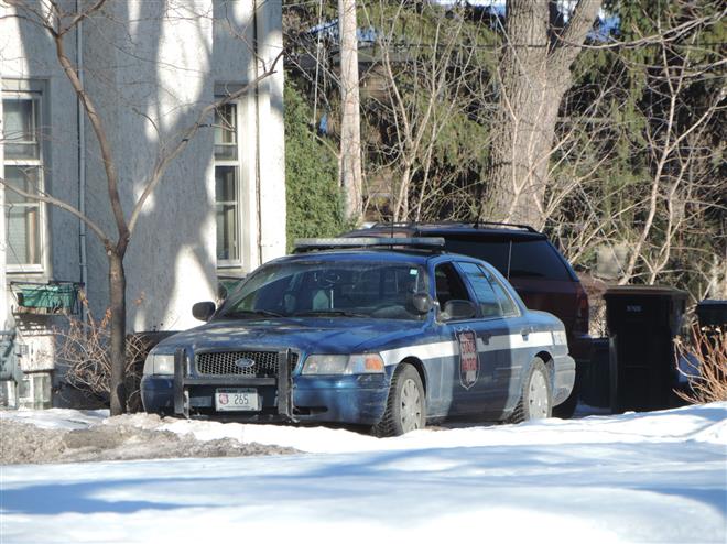 A state patrol car is stationed near Gov. Scott Walker’s Wauwatosa home.