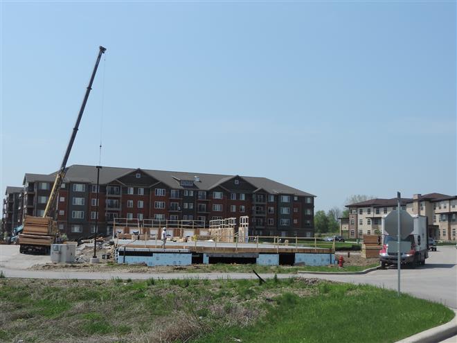 Construction is underway to add market-rate apartments on River’s Bend Lane.