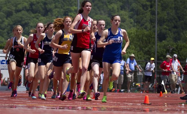 Wauwatosa East’s Natalie Schudrowitz and Brookfield Central’s Elizabeth Flatley, long-time rivals, compete in the 3200-meter run at the WIAA State Track and Field Meet on June 6 in La Crosse. She won in 10 minutes, 39.94 seconds.