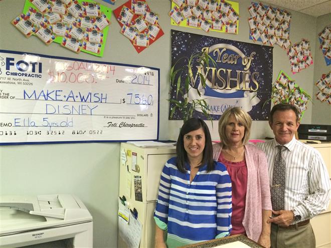 Foti Chiropractic offers $40 screenings to raise funds for Make-A-Wish foundation. Felicia Toy (left), Jenny Foti and David Foti comprise the family-owned business.