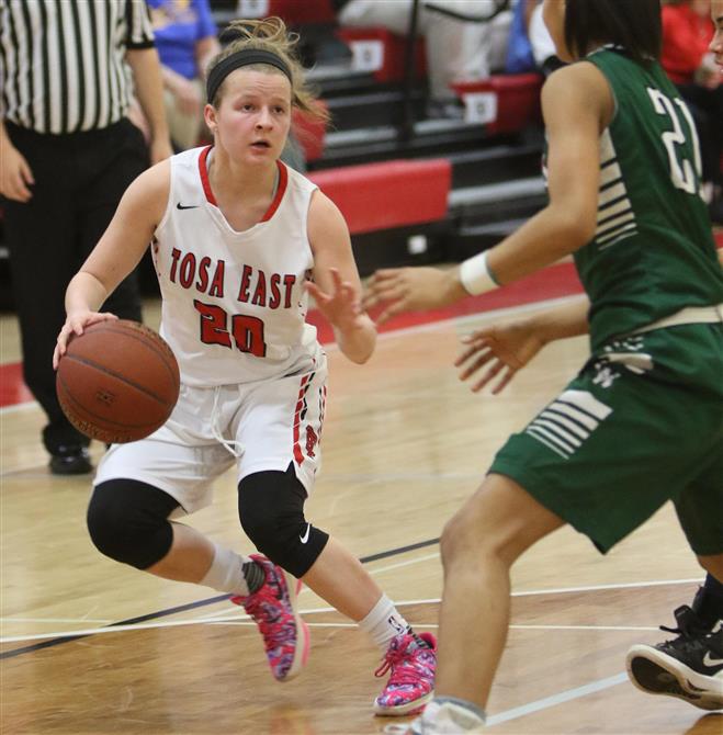 Wauwatosa East senior Bailey Berlin, shown against Tosa West, had 20 points in the Regional Championship win over Shorewood on Feb. 27. East next plays Milwaukee South.