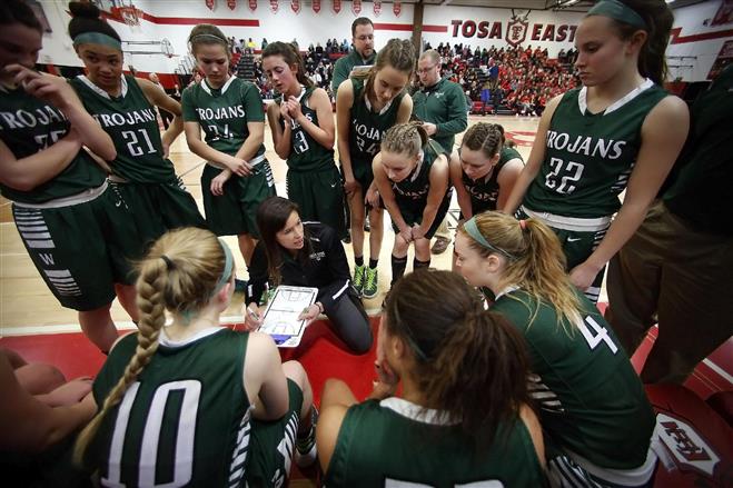 Wauwatosa West girls basketball coach Ashley Imperiale talks to the team during a timeout. The team wrapped up its season with an awards banquet.