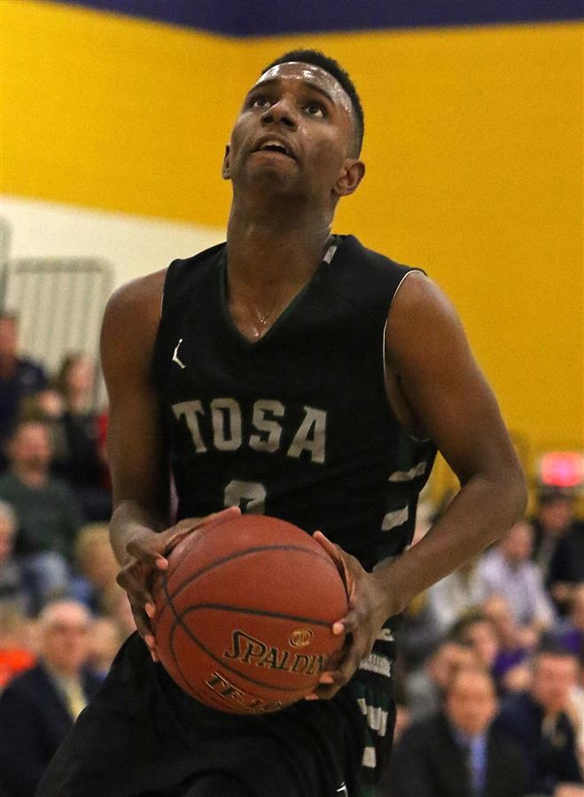 Wauwatosa West sophomore LaRon Perine was named Most Improved Player in 2015-16. The Trojans finished 12-11 overall.