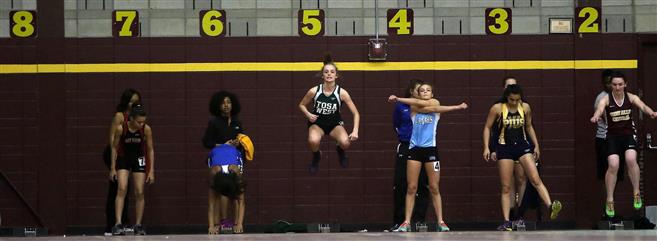 Wauwatosa West’s Lauren Nemitz jumps as she readies herself for the 55-meter dash during the Doug Johnson Invitational. Tosa West finished 11th of 13 teams.