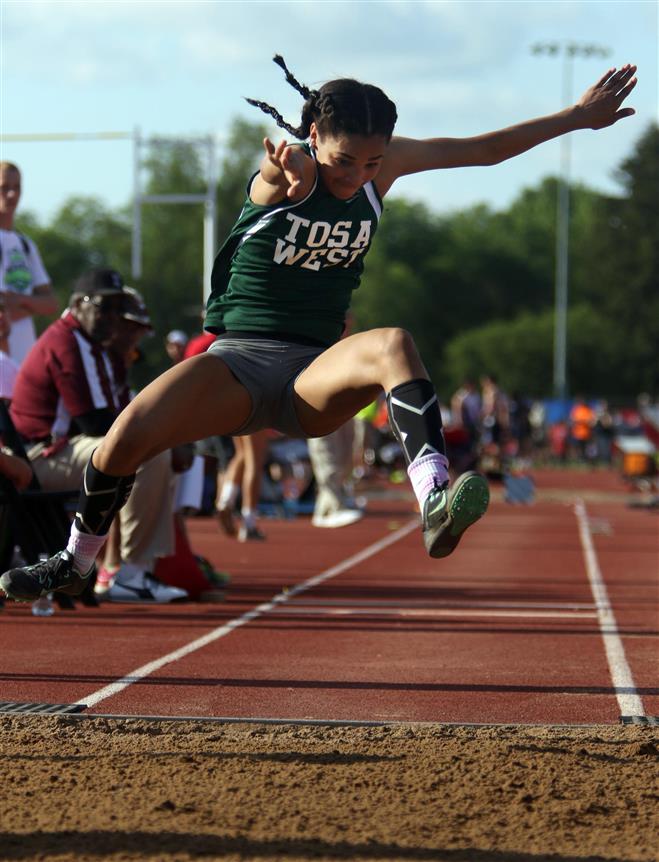 Wauwatosa West’s Cheri’A Adams, shown here at the state meet last year, took first in the 200-meter dash and the triple jump at the Woodland Conference Indoor Championships on April 8 at UW-Parkside. She also finished second in the 55 dash and in the long jump.