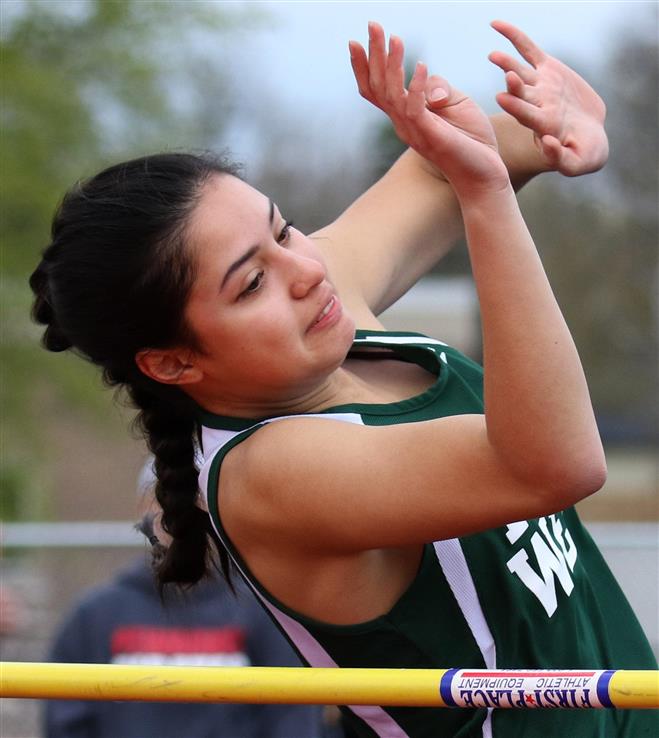 Wauwatosa West’s Jade Tanjung competes in the high jump at the Woodland Conference Relays on May 3 at Brown Deer. The Trojans finished third at the Relays.