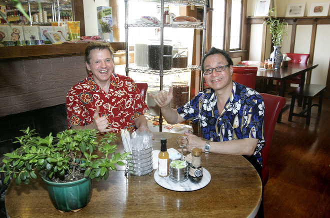 Guy Roesler (left) and David Lau have opened Ono Kine Grindz, a restaurant featuring foods and products for Hawaiian "surf food," a blend of Pacific food styles, at 7215 W. North Ave ina space that was once a residential bungalow.