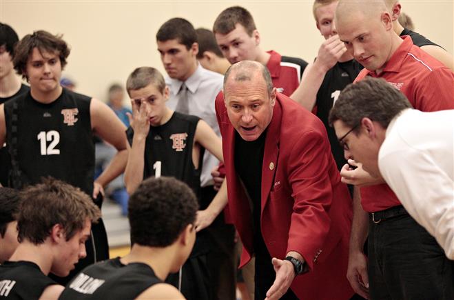 Tosa East coach John Simon talks to his team during a timeout against Brookfield Central on Nov. 1 at the WIAA sectional final.