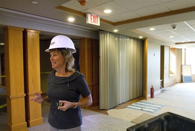 Ronald McDonald House President and CEO Ann Petrie conducts a tour of the facilities new expansion.