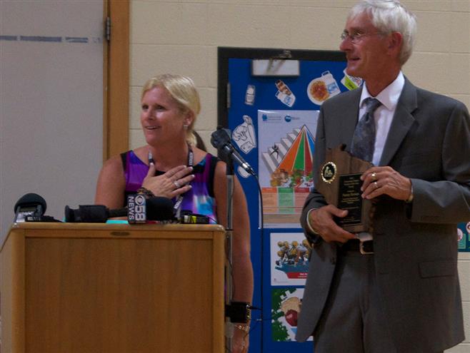 Eisenhower Elementary School teacher Nancy Terrian is presented with the award.