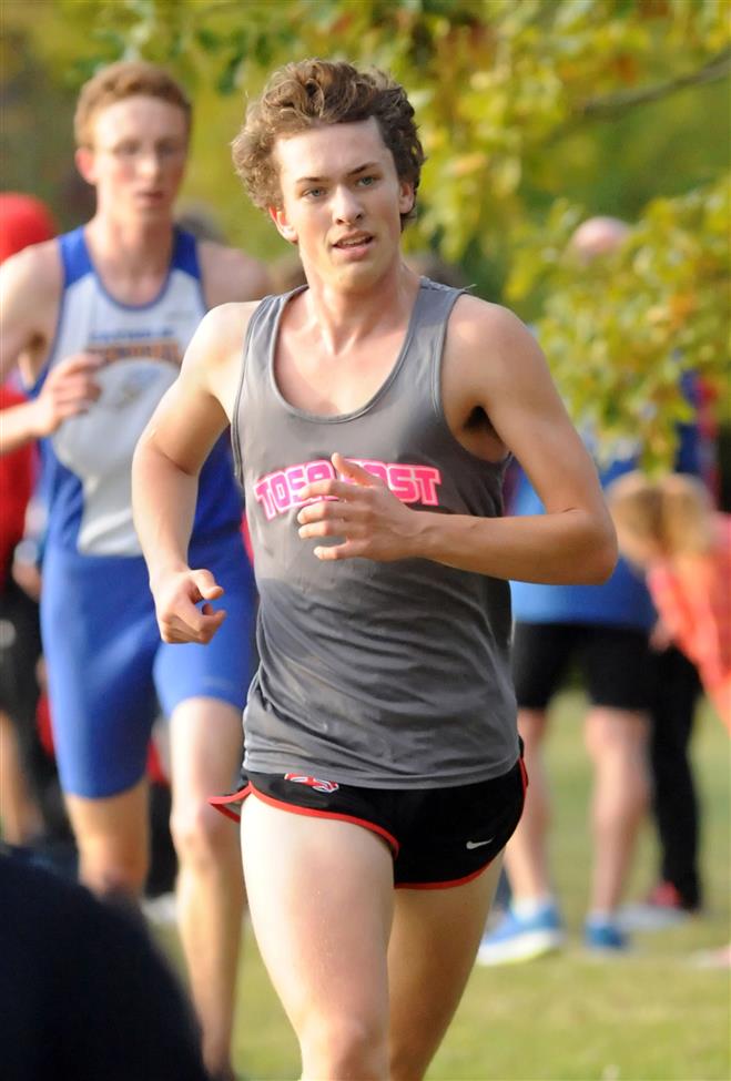 Wauwatosa East senior Noah Froh took 21 st  with a personal record 16:57 at the Wisconsin Lutheran Invite.