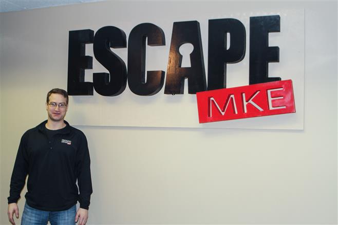 Matt Ames, co-founder of Escape MKE, a new Wauwatosa immersion-experience venture, stands in the briefing room of the new business April 6.