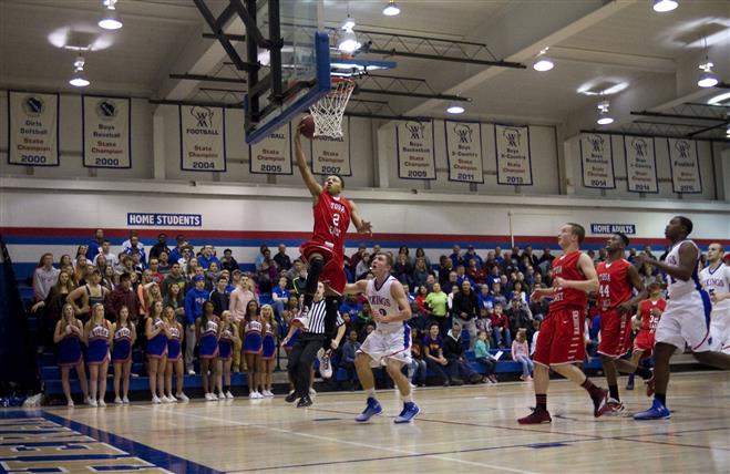 Wauwatosa East’s Bryce Beekman (2) was the MVP on this season’s Red Raiders team, which surprised the critics, winning 19 games and falling one win short of the state tourney.