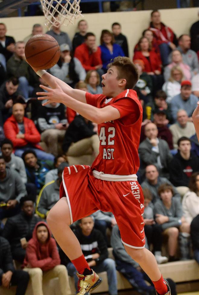 Wauwatosa East’s Blake Kratzer drives for a layup agasint Cedarburg in the Rick Majerus WYB Shootout. East defeated the Bulldogs, 56-51. Wauwatosa East’s Blake Kratzer drives for a layup agasint Cedarburg in the Rick Majerus WYB Shootout. East defeated the Bulldogs, 56-51.