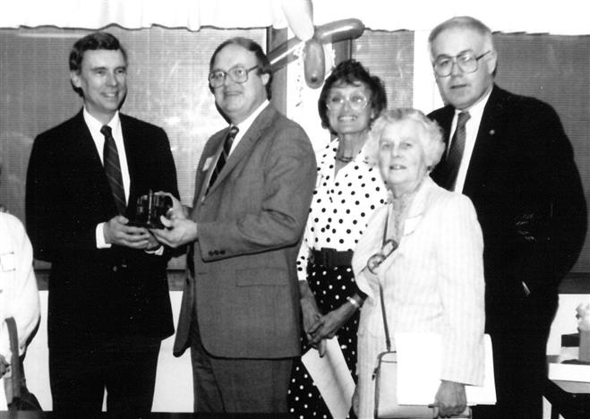 Gordon Ralph and Literacy Services supporters J. Thomas Christofferson (from left), Joyce Engstrom, Julia Harding and Robert Schweers at an annual meeting of Literacy Services of Wisconsin  in the early 1980s.
