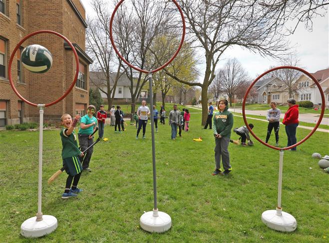 Students ride brooms and try their hand at Quidditch, a game made popular from the Harry Potter books. The game was led by the Marquette University Quidditch team during Washington Elementary School’s High Interest Day on April 29.